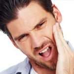 Болит челюсть: основные причины, диагностика и лечение